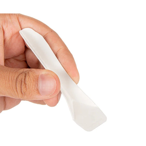 Petite cuillère en papier blanc de 9,4 cm.