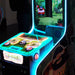 Éclairage turquoise du jeu d'arcade Timberman de la marque Magic Play.