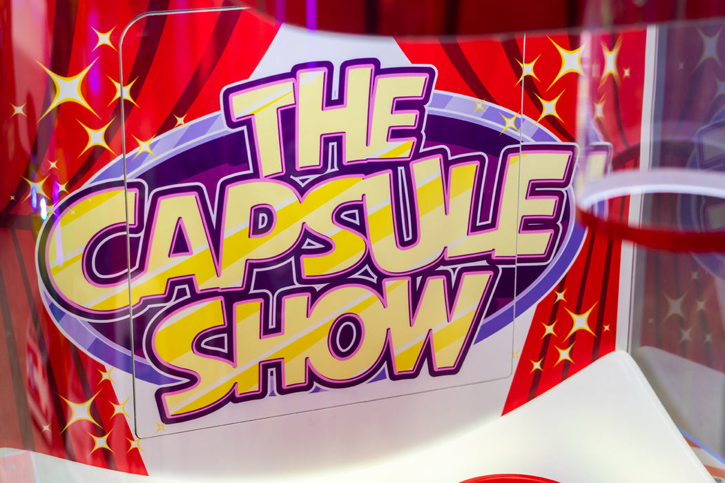 Logo du distributeur de lots The Capsule Show de la marque Magic Play.